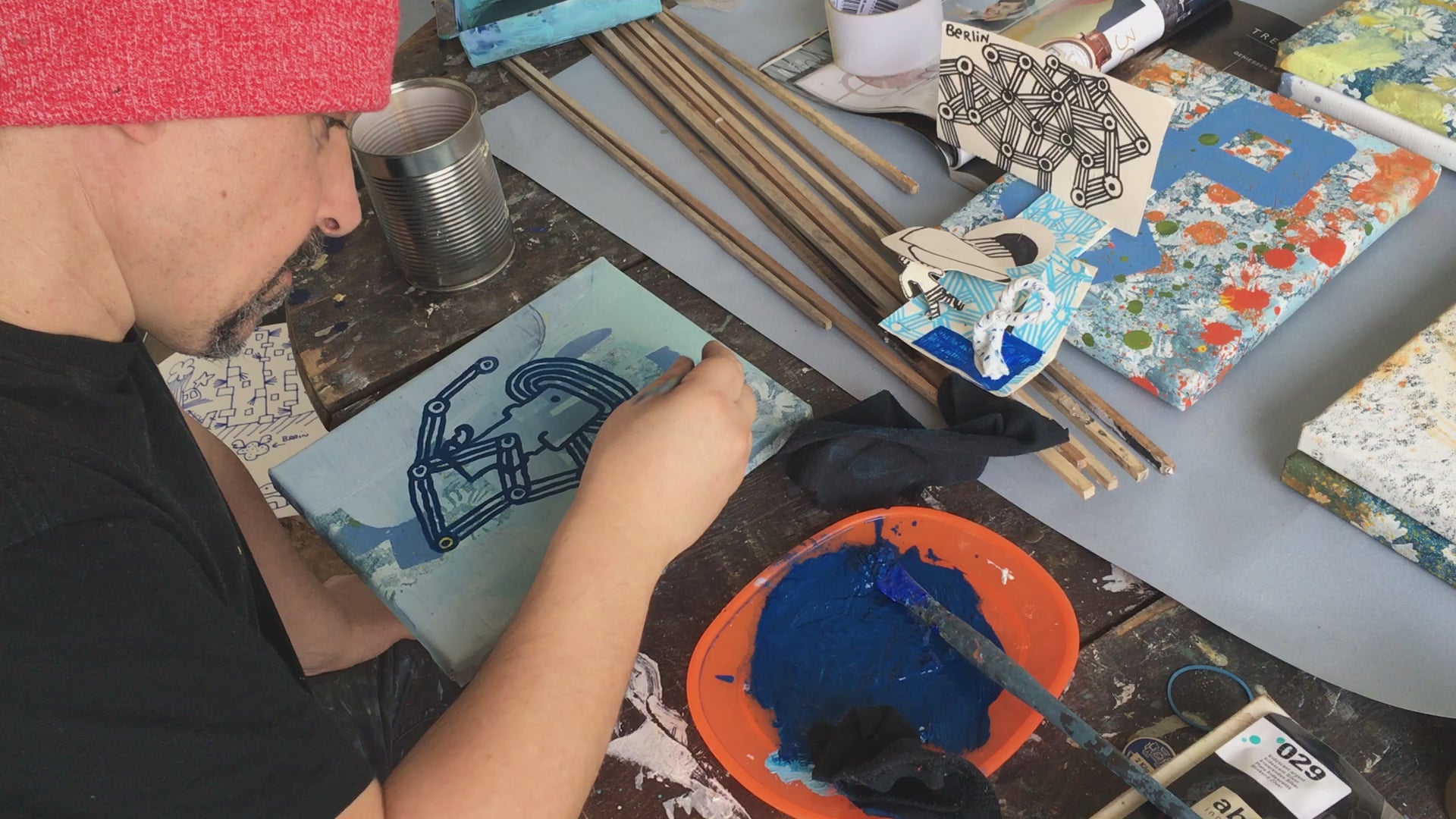 Load video: Martin Finnin painting &quot;Roberto and the Doves&quot; in Italy.